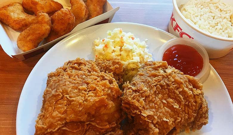 Hot & spicy chicken, colonel rice, coleslaw, and nuggets in KFC Philippines.
