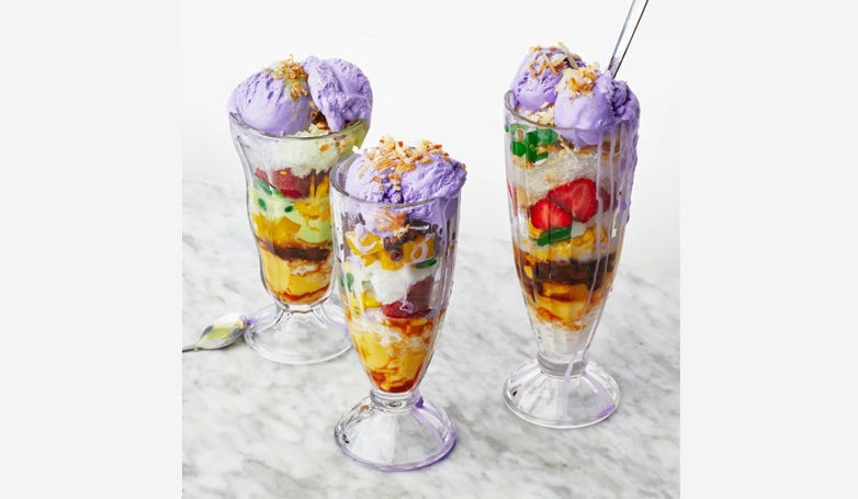 Halo -halo is Filipino dessert mixed with shaved ice, sweet beans, fruits, and purple yum