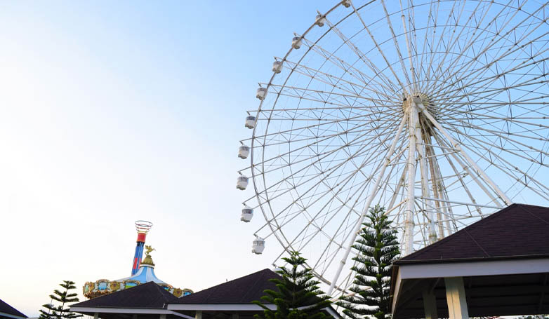 a Ferris wheel standing at 63 meters that provides panoramic views of the surrounding landscape. 